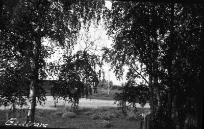 Vy över järnvägsområdet med järnvägsstation; Vassaraälven; bilden är tagen från Andra Sidan.