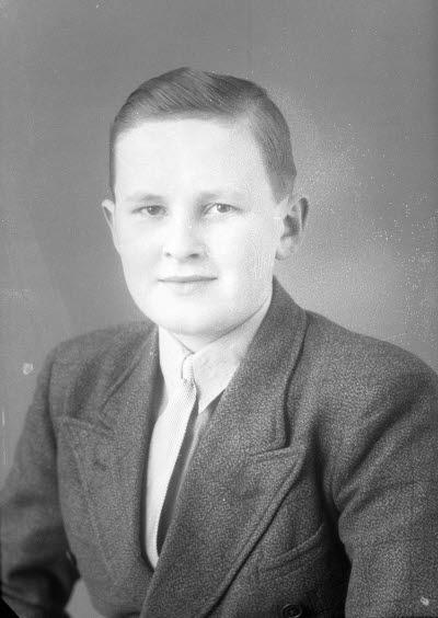 Porträtt av en pojke. Ateljefoto.