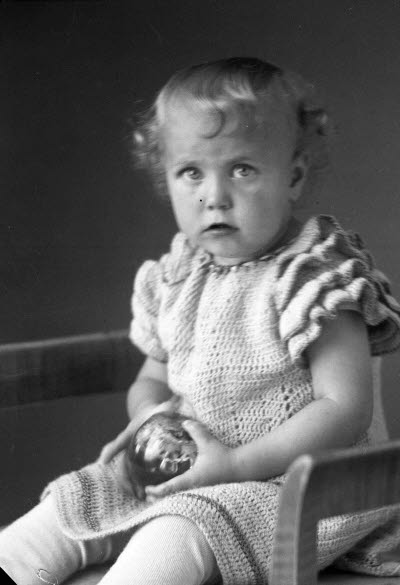 Porträtt av ett barn. Ateljefoto.